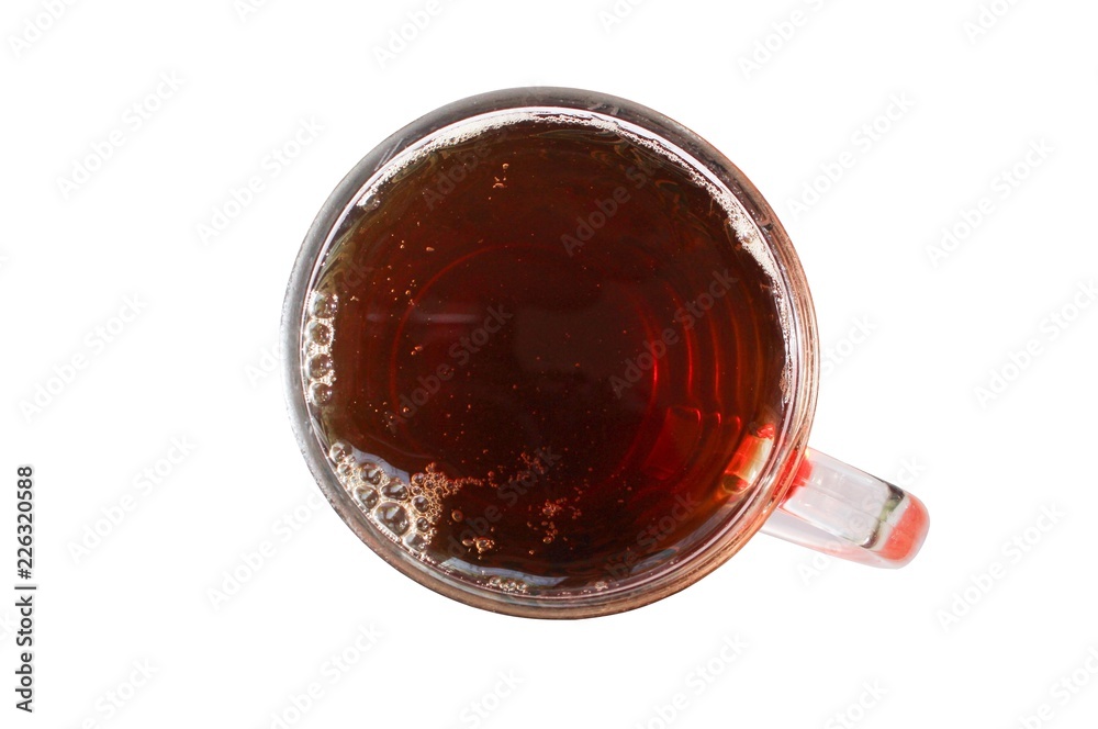 Black tea is a beautiful color in a transparent mug. View from above. Black tea is a beautiful color in a transparent mug. View from above.