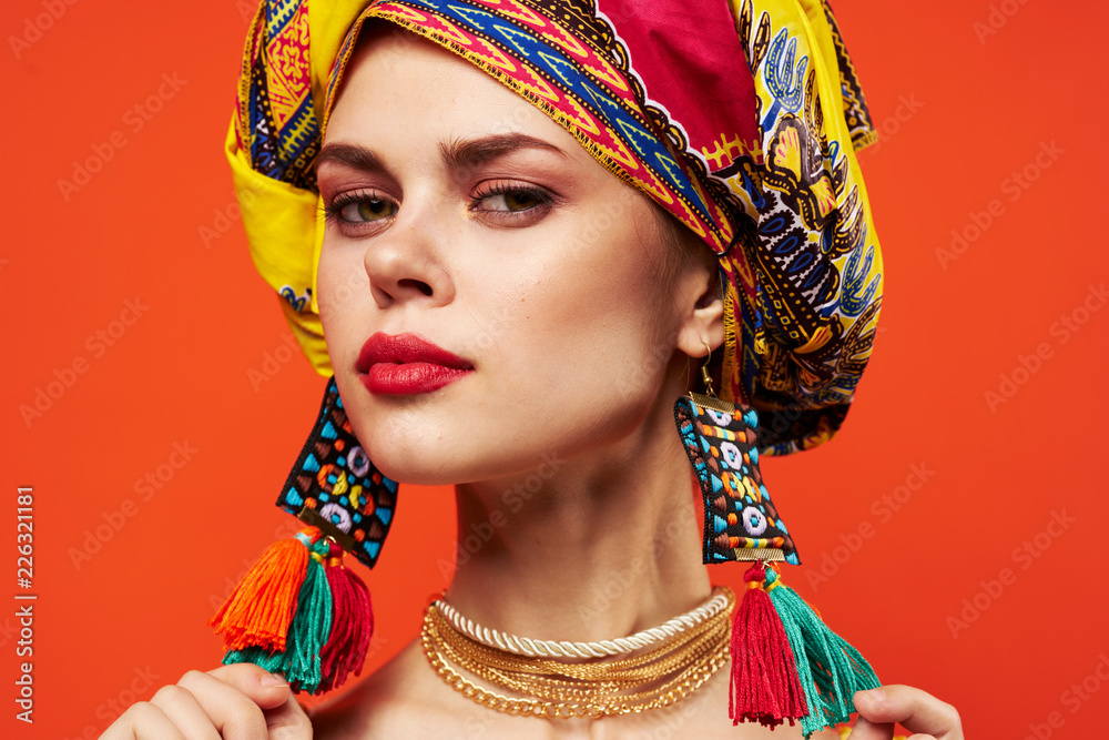 woman in color turban evening makeup