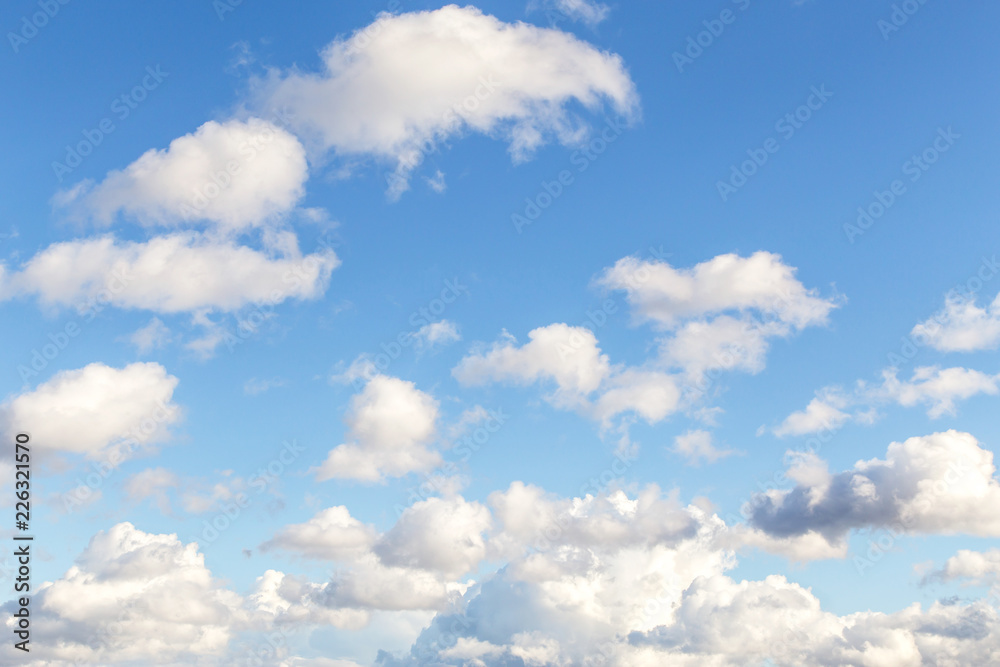 Fototapeta premium Cumulus white clouds against blue sky background 