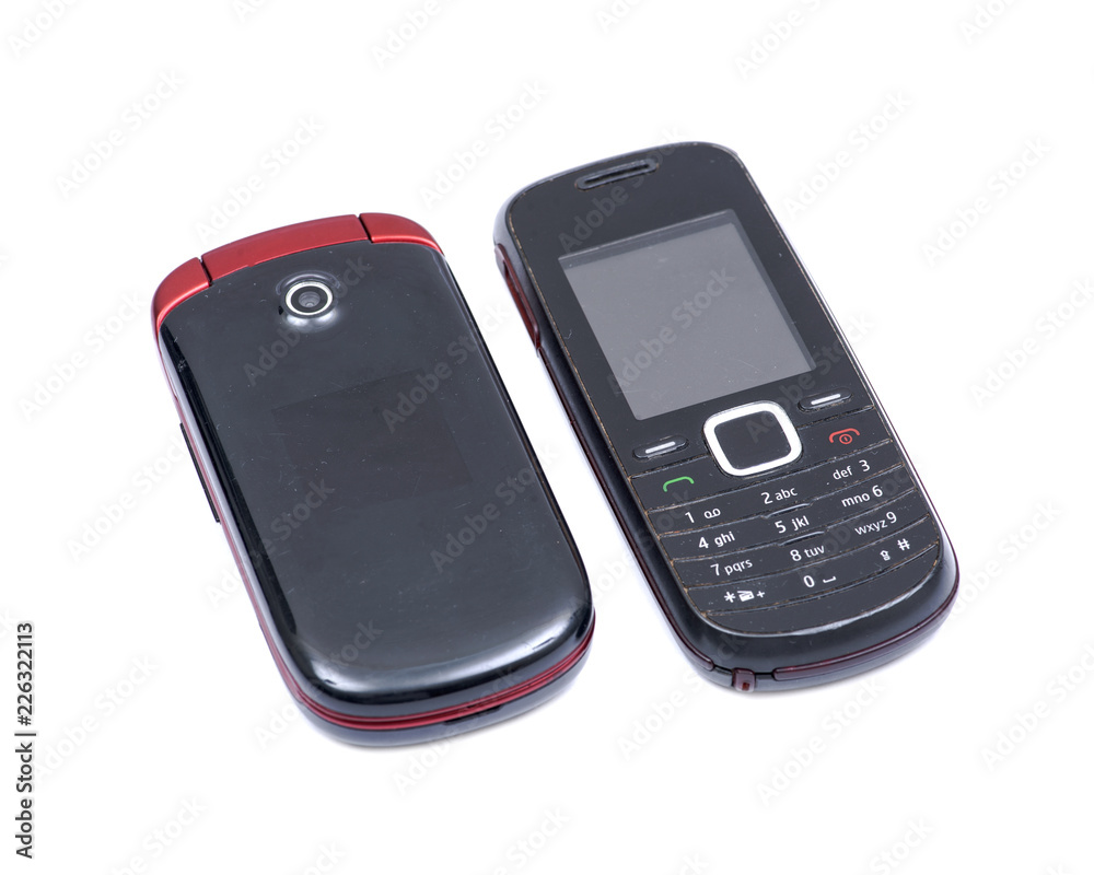 Old Used retro cell mobile phone isolated on white background