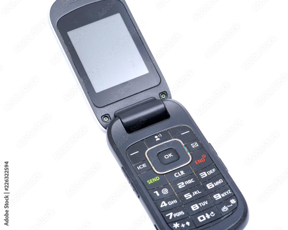Old used flip cell phone isolated on white background Stock Photo | Adobe  Stock