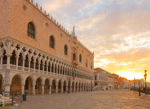 famous Doge palace and embanlment of lagoon at sunrise, Venice, Italy