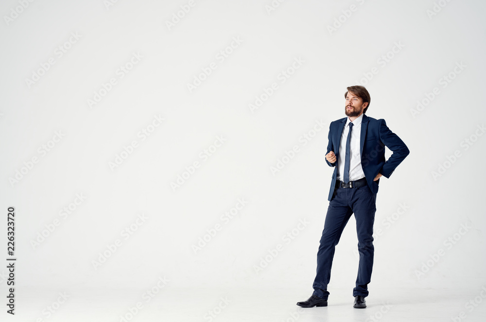 man in a suit on a light background free place man in a suit on a light background free place