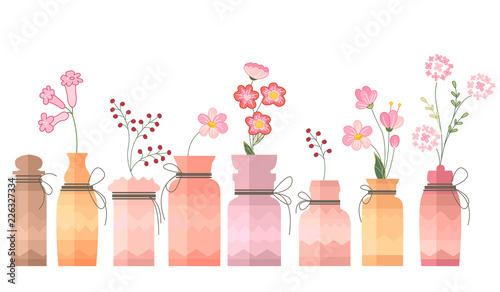 Small vintage decorative bottles on white.