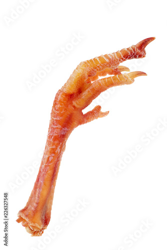 Cured chicken feet isolated on white background