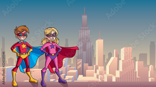 Illustration of superhero children smiling happy while wearing capes against city background for copy space.