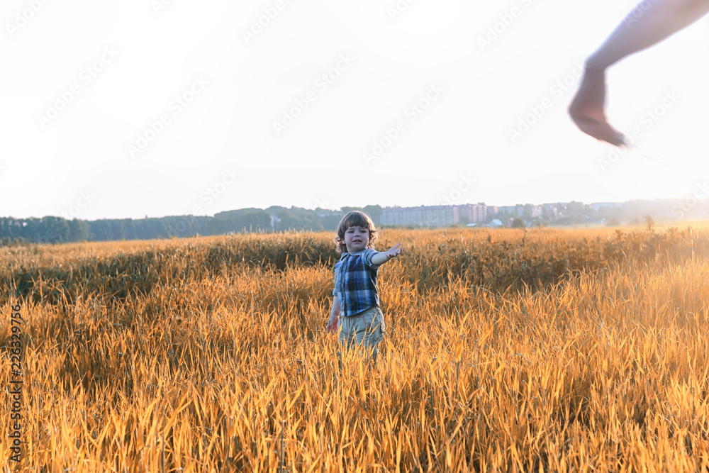 Children outdoors in a field Children outdoors in a field