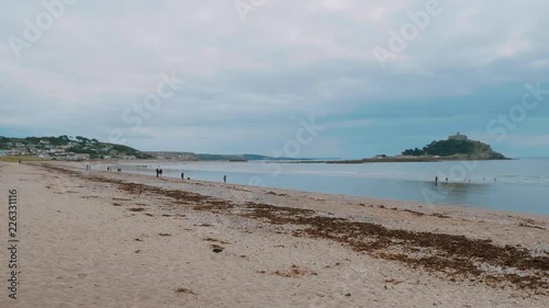 The beach of Marazion in Cornwall - a surfer s paradise photo