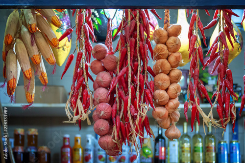 Photography Dried paprikas and garlic strings at the Central market hall in Budapest, Hungar
