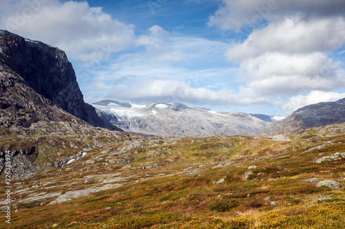 Rugged dramatic mountain landscape in norway cloudy dramatic day