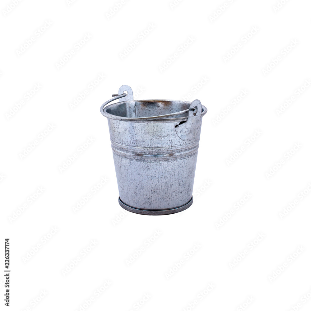 Photo of little metalic bucket isolated on a white background