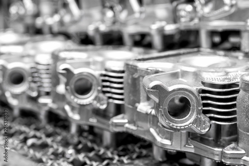 Pile of aluminum automotive parts head cylinder, casting process in the automotive factory