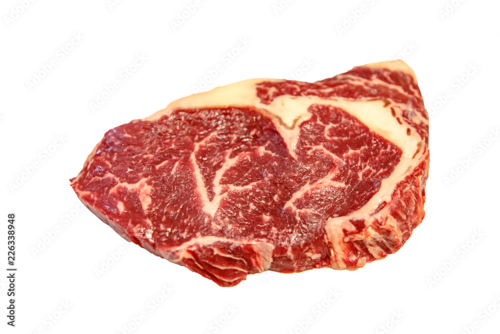 Raw marbled beef entrecote, isolated Raw marbled beef entrecote, isolated