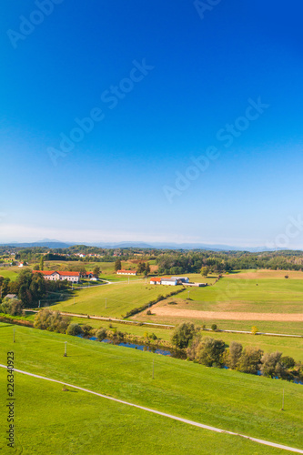 Croatian farmlands in countryside, panoramic view of river Dobra in Novigrad, Karlovac county 