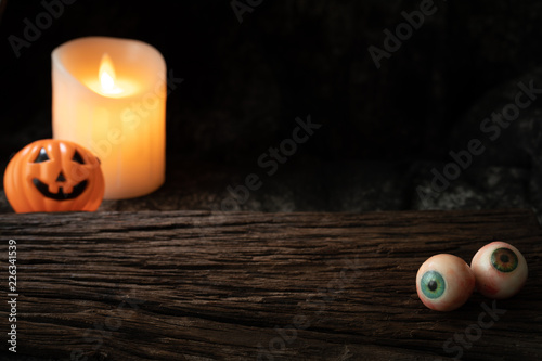 halloween spooky horror scare background skull candle eyeball dark tone