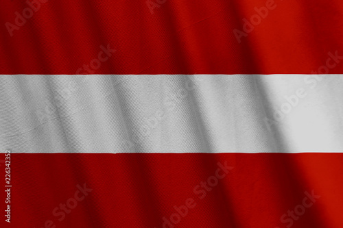Waving Austrian flag with a fabric texture