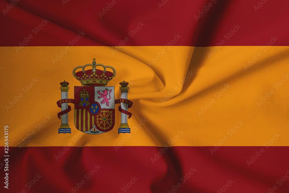 Waving Spanish flag with a fabric texture