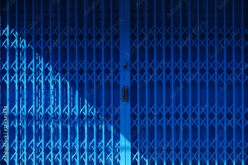 Naklejka premium Blue steel door background