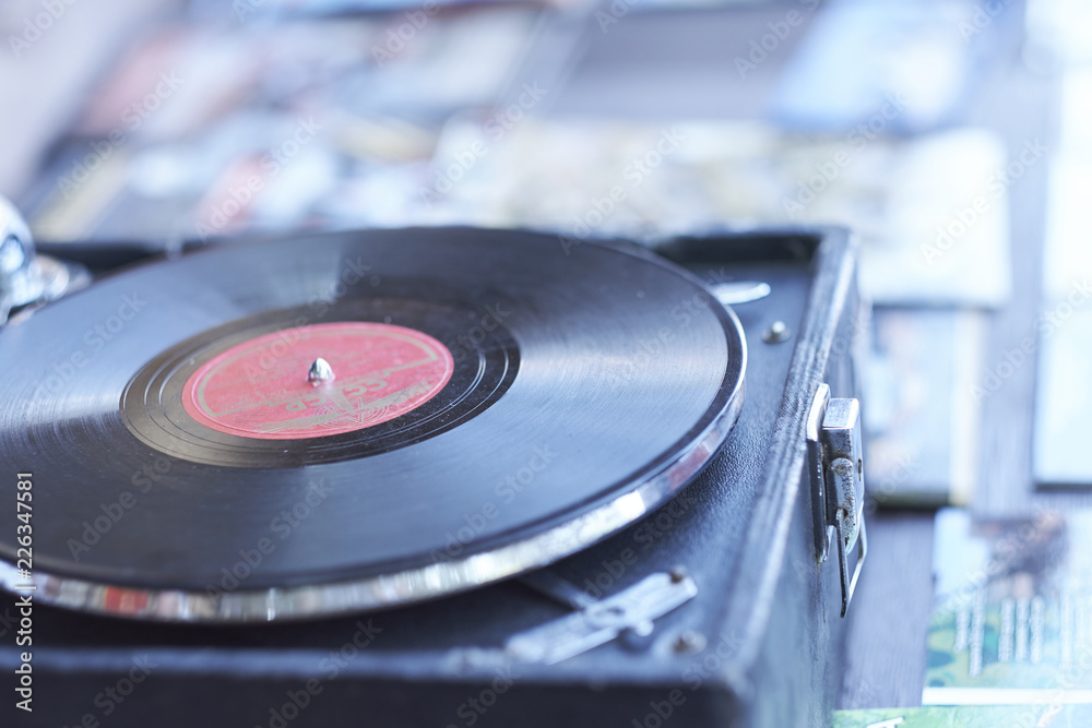 gramophone head and vinyl disk close up gramophone head and vinyl disk close up