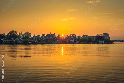 Sunset above the beautiful village of Zaanse Schans in Holland © Nick Fox