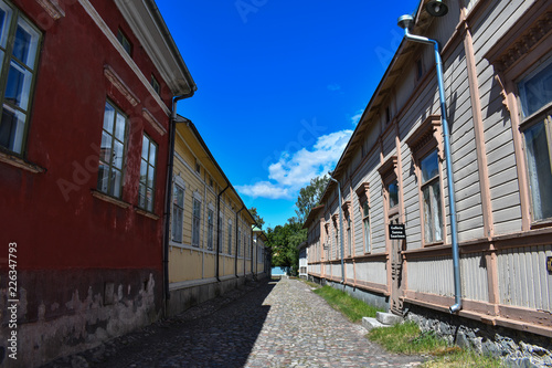 Fototapeta Naklejka Na Ścianę i Meble -  One of Old Rauma's streets that looked so empty without the people passing by.