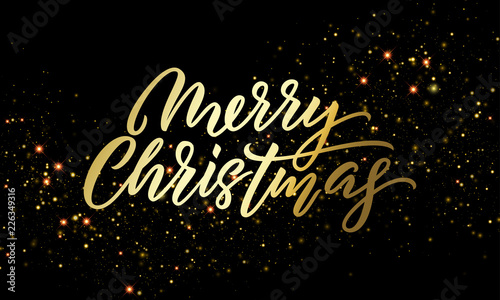 Merry Christmas golden light sparkles and gold calligraphy lettering. Vector Xmas holiday golden glitter or Christmas confetti on black background