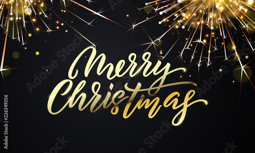 Merry Christmas golden firework sparkles and gold calligraphy lettering. Vector Xmas holiday golden glitter light blurs of Christmas confetti on black background