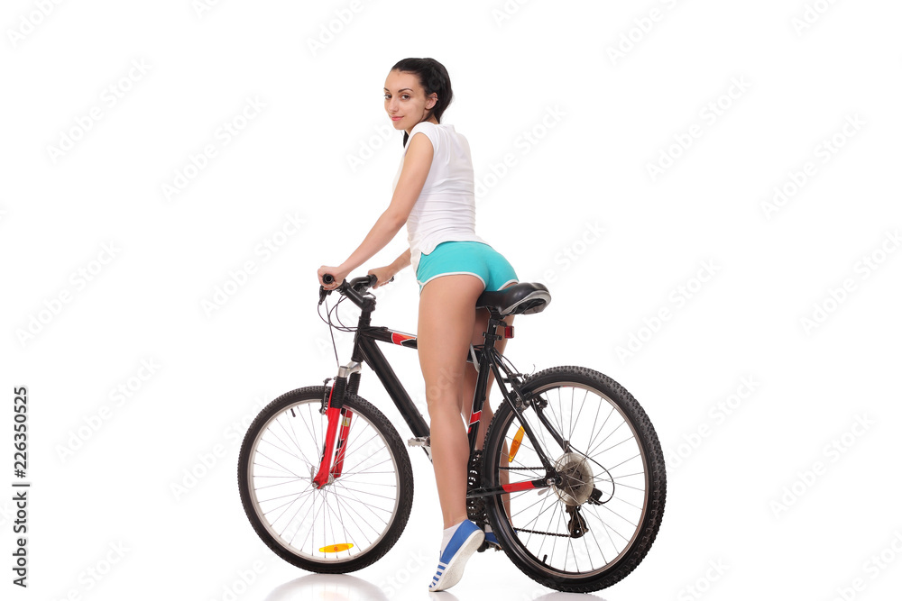 young athletic girl on a bicycle young athletic girl on a bicycle