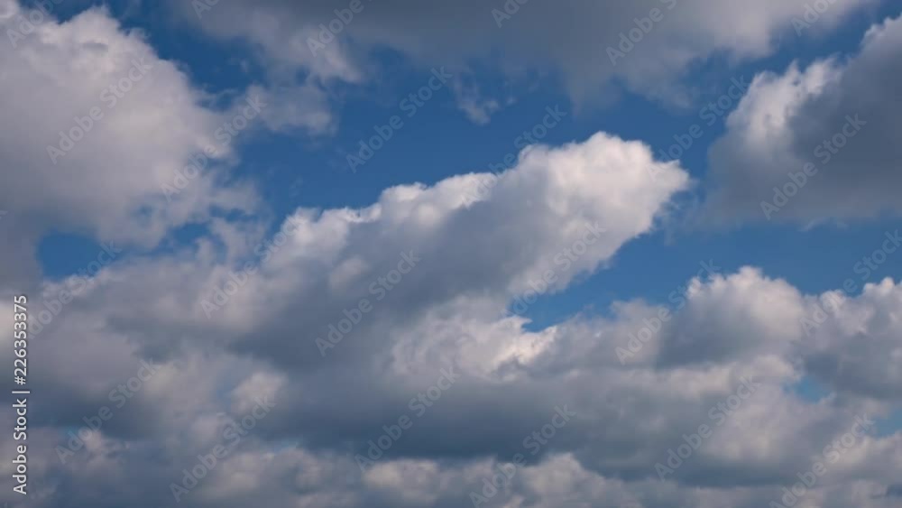 Fluffy clouds on blue sky moving fast. Beautiful cinematic background. 4K time lapse.
Fluffy clouds on blue sky moving fast. Beautiful cinematic background. 4K time lapse.