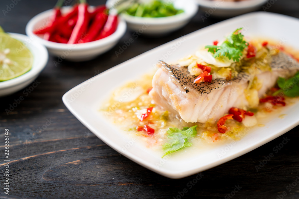 Steamed Grouper Fish Fillet with Chili Lime Sauce in lime dressing Steamed Grouper Fish Fillet with Chili Lime Sauce in lime dressing