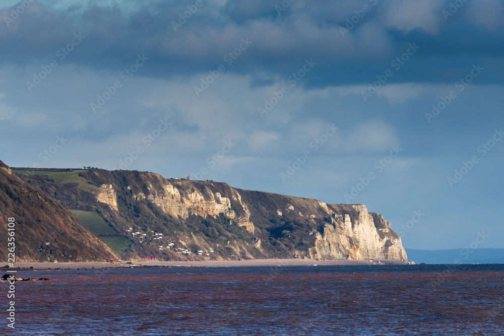 Naklejka premium White Rocks near Salcombe Regis on the south coast of Devon. View from the city of Sidmouth. UK