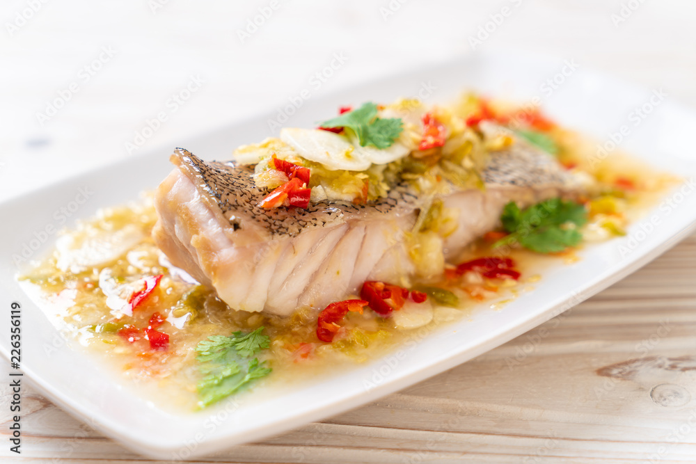 Steamed Grouper Fish Fillet with Chili Lime Sauce in lime dressing Steamed Grouper Fish Fillet with Chili Lime Sauce in lime dressing