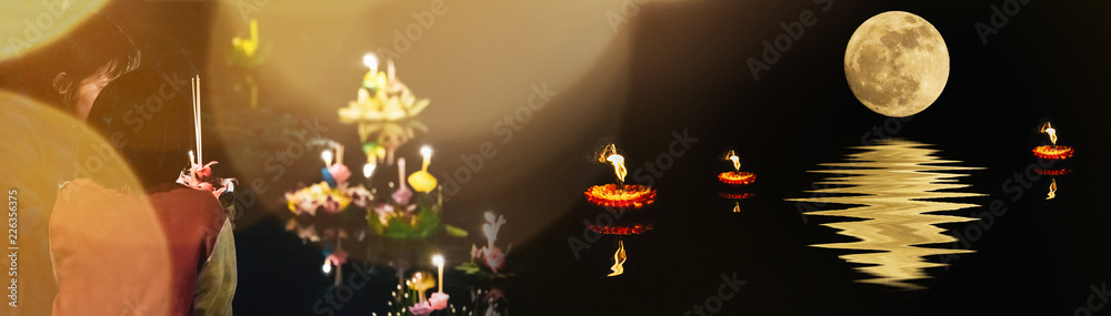 Fototapeta premium banner design and holiday concept from people pray and hold hand made krathong by flower from loykratong festival in thailand culture on november