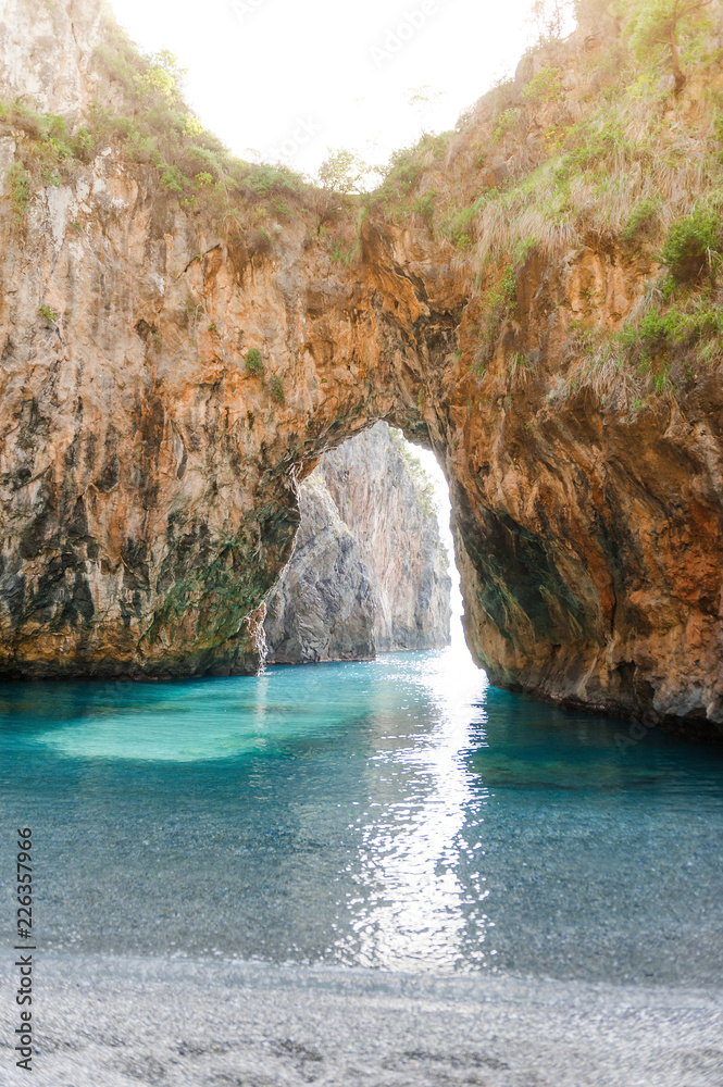 Natural Arch of Arcomagno San Nicola Arcella, Tyrrhenian Sea, South of Italy.