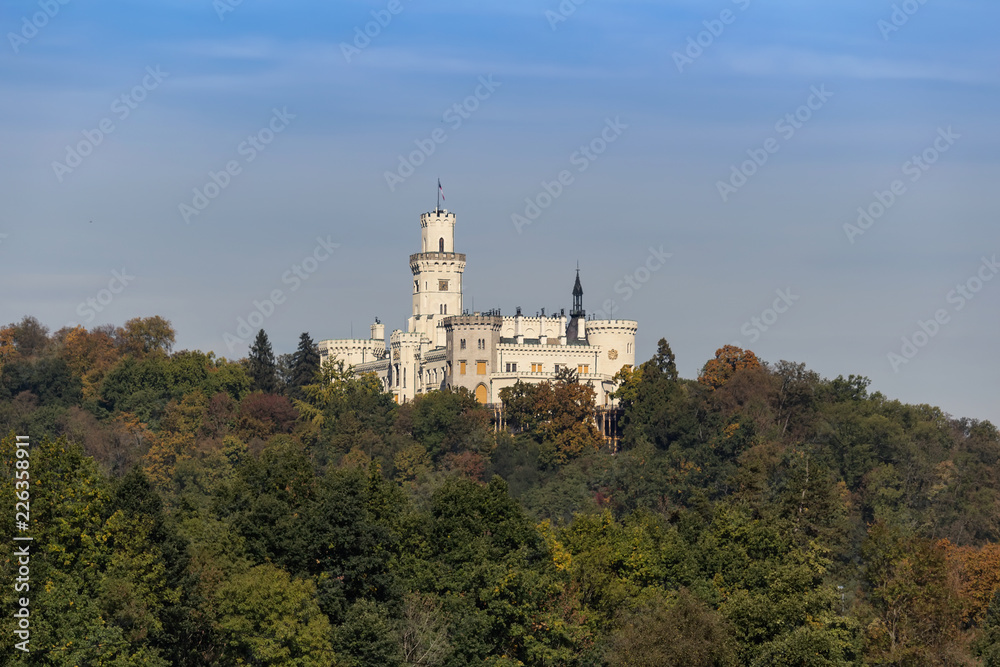 Castle Hluboka nad Vltavou with autumn trees
