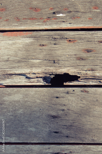 Wooden floor is made of old wooden boards with beautiful patterns