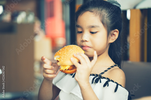 asian Children eat chicken cheese Hamburger Food Court