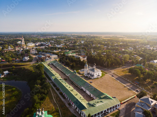 Beautiful panoramic view of Suzdal in summer at sunrise. Resurrection Church on the market square in Suzdal. Suzdal is a famous tourist attraction and part of the Golden Ring of Russia