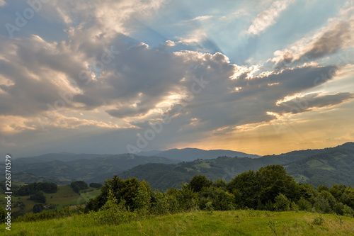 Stunning nature with misty landscape Holbav village Carpathians Transylvania Romania Europe