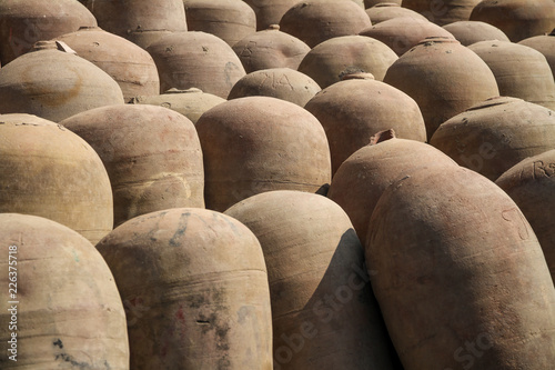 ceramic barrels of peruvian pisco wine production, close up