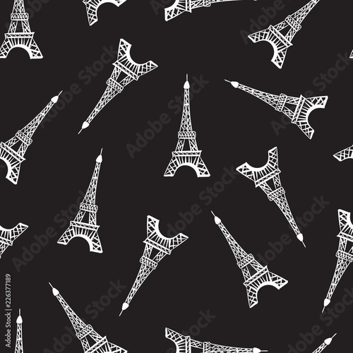 Seamless pattern. Modern design print fabric. Illustration white ink Eiffel Tower. Abstract ornament hand drawing. Vector illustration is isolated on a black ground.