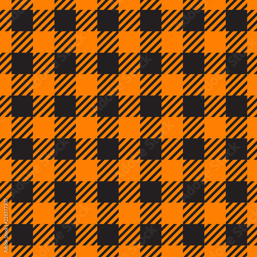 Vector Seamless pattern. Cell background orange color fashion cloth in a cage. Abstract checkered backdrop on dark.