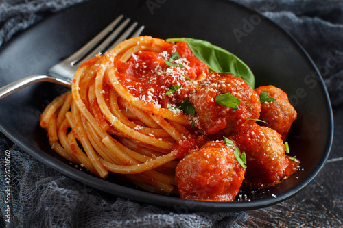 Pasta with tomato sauce and meatballs photo