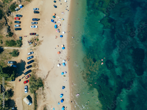 Beach with sun beds, view from above