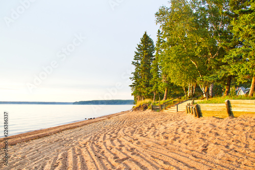 Lines in the sandy beach of Waskesiu Lake in Prince Albert National Park of Canada. photo