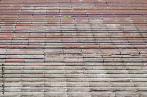 Steps of the old concrete stairs to the stadium. Fragment.