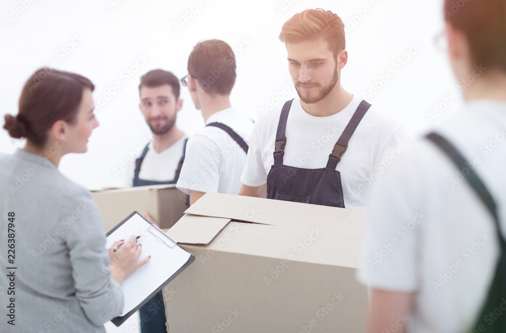 Manager and movers isolated on white background. Manager and movers isolated on white background.