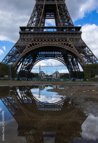 A reflection of the bottom half of the Eiffel Tower
