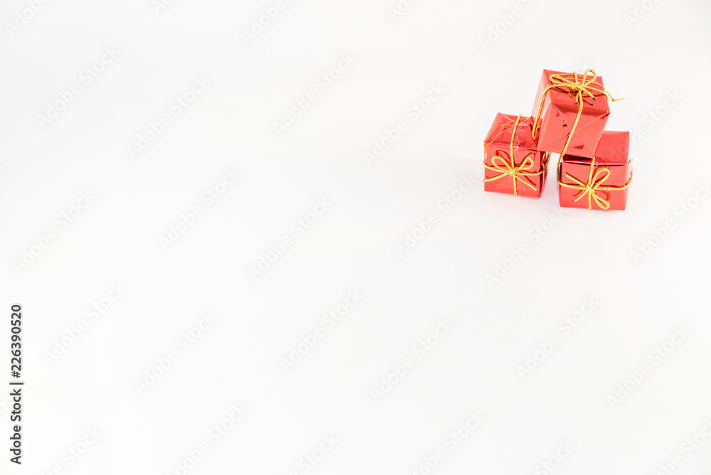 white background with space to write with red gifts. Merry Christmas
