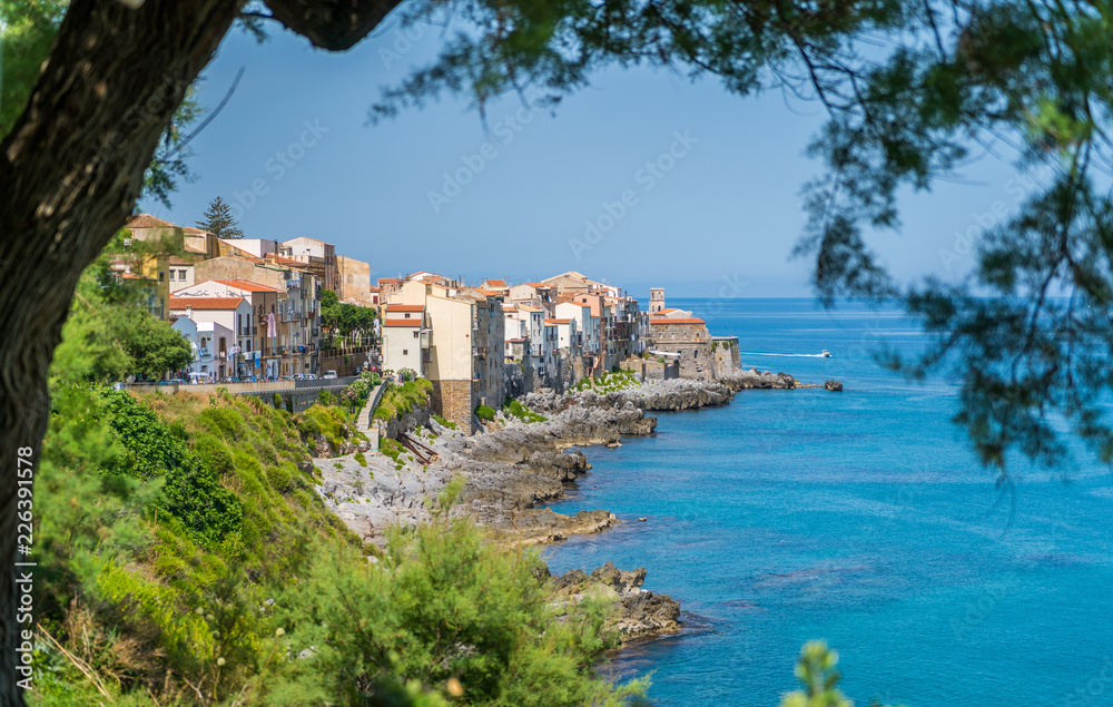 Cefalù waterfront on a sunny summer day. Sicily, southern Italy.